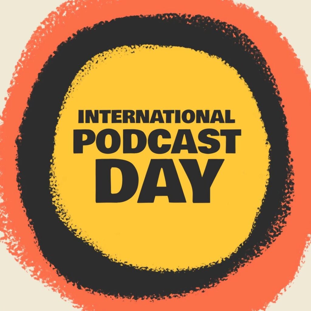 Graphic with a yellow center, black text reading "International Podcast Day," surrounded by black and orange concentric circles.